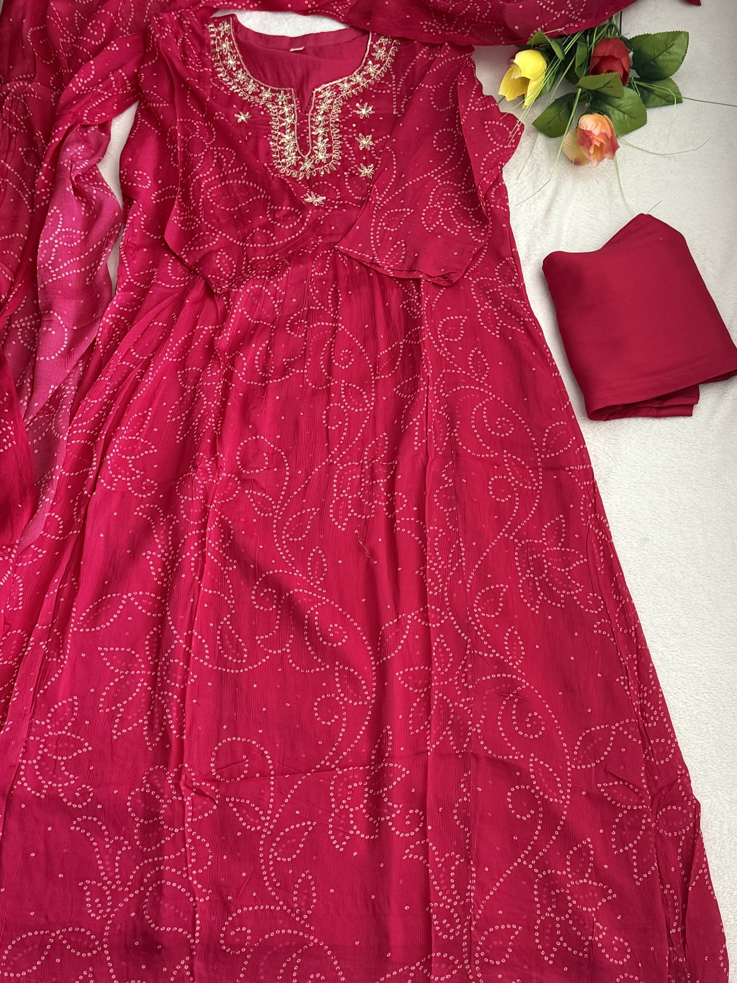 Beautiful pink A-line chinnon lightweight bandhini kurti set