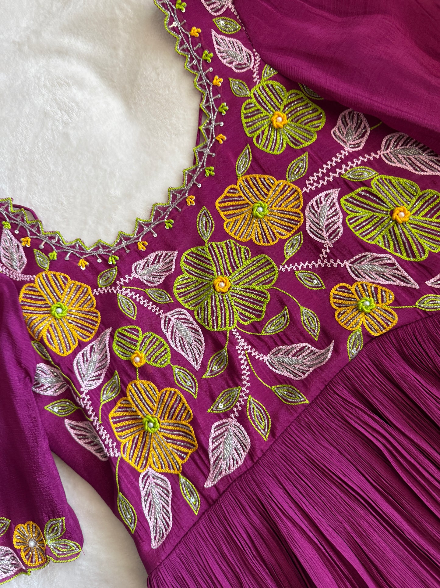 Magenta pink long anarkali designer dress with maggam work on the yolk