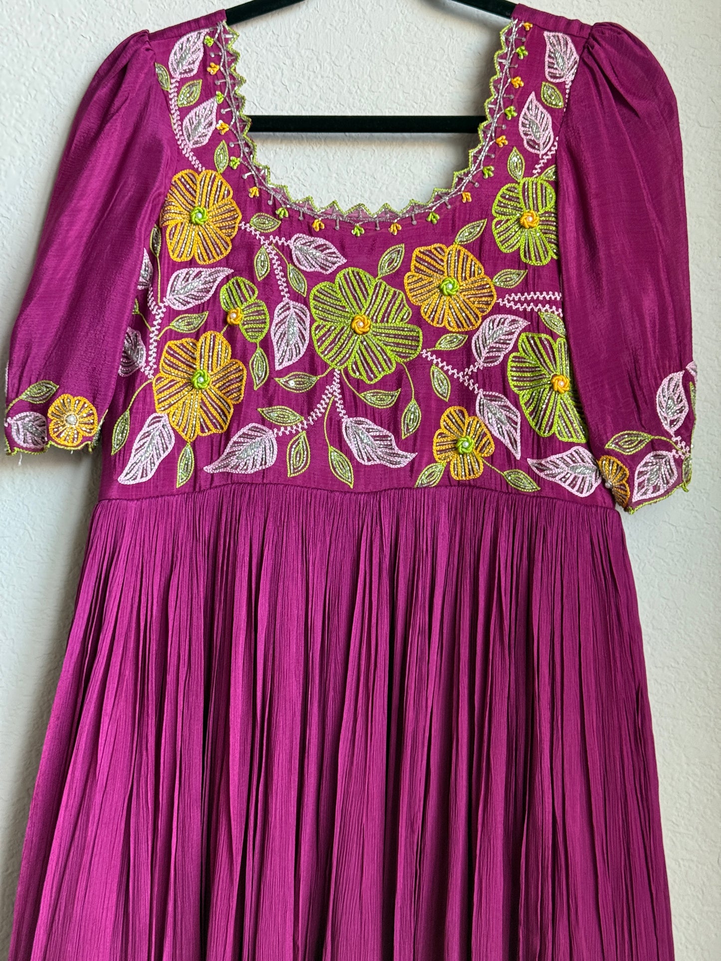Magenta pink long anarkali designer dress with maggam work on the yolk