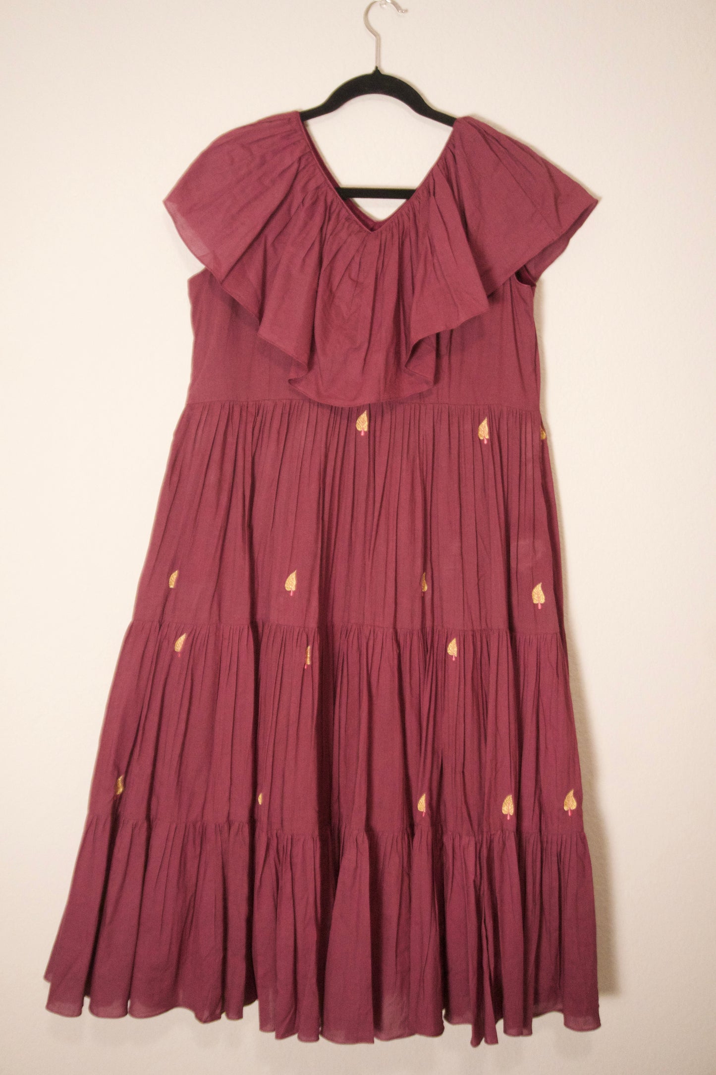 Plum shade mul cotton embroidered frock with unique neck pattern