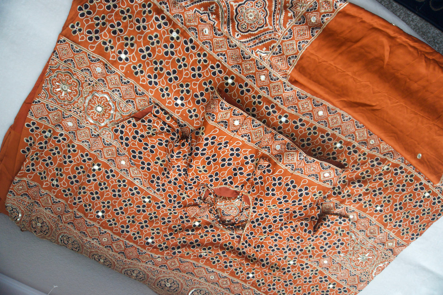 Rust Orange Ajrakh Modal Silk Handwork Saree
