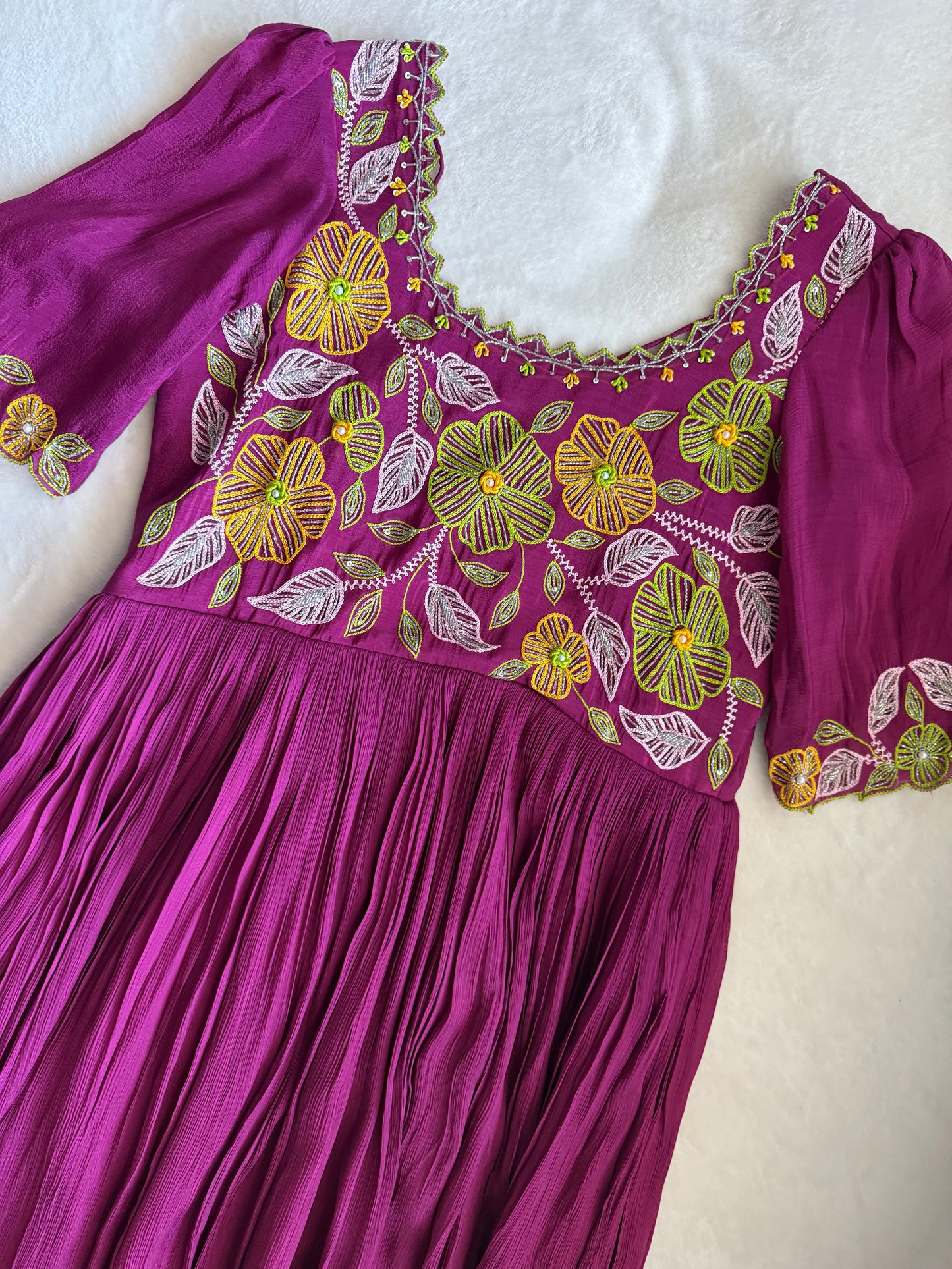 Magenta pink long anarkali designer dress with maggam work on the yolk