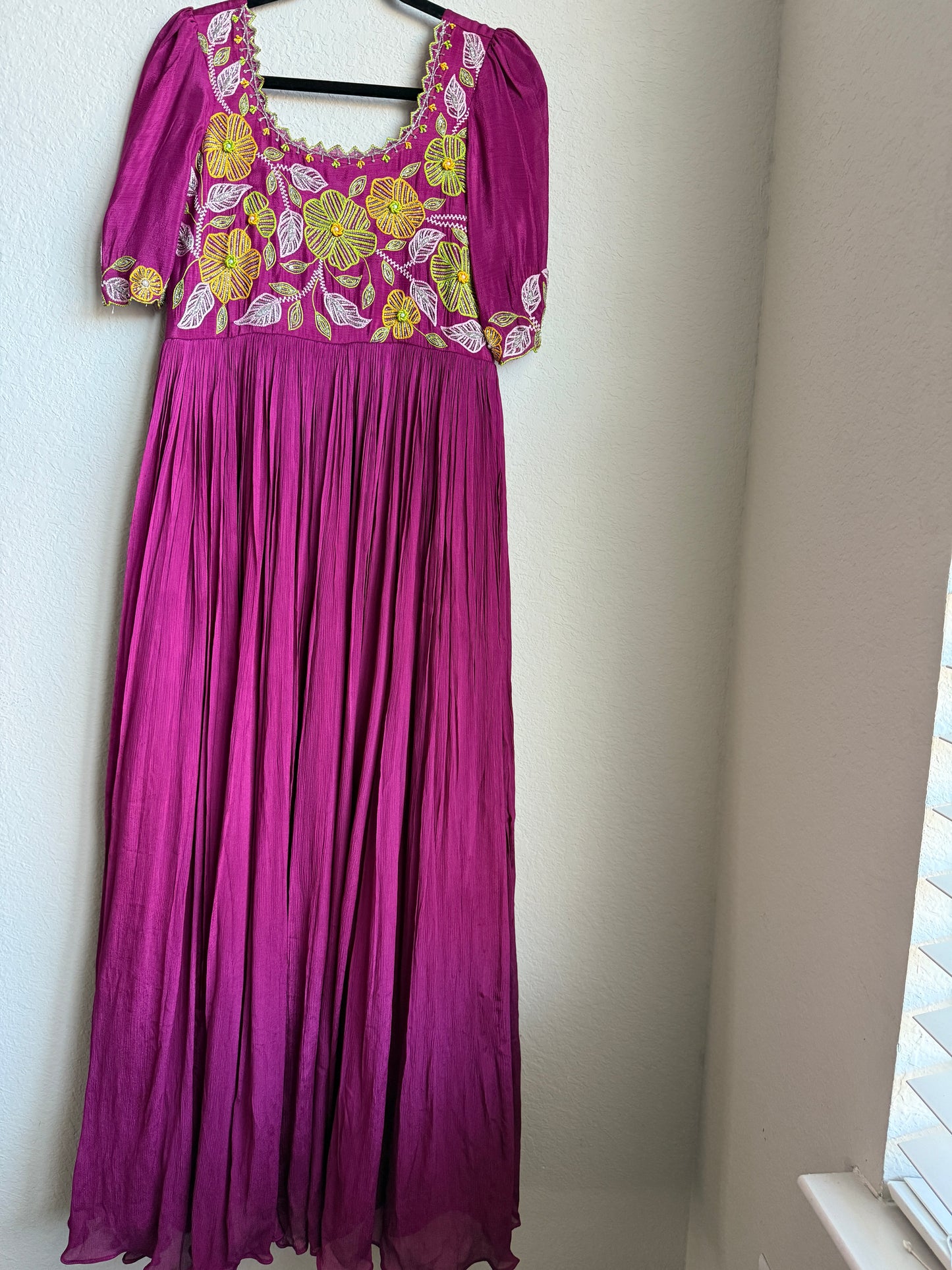 Magenta pink long anarkali designer dress with maggam work on the yolk