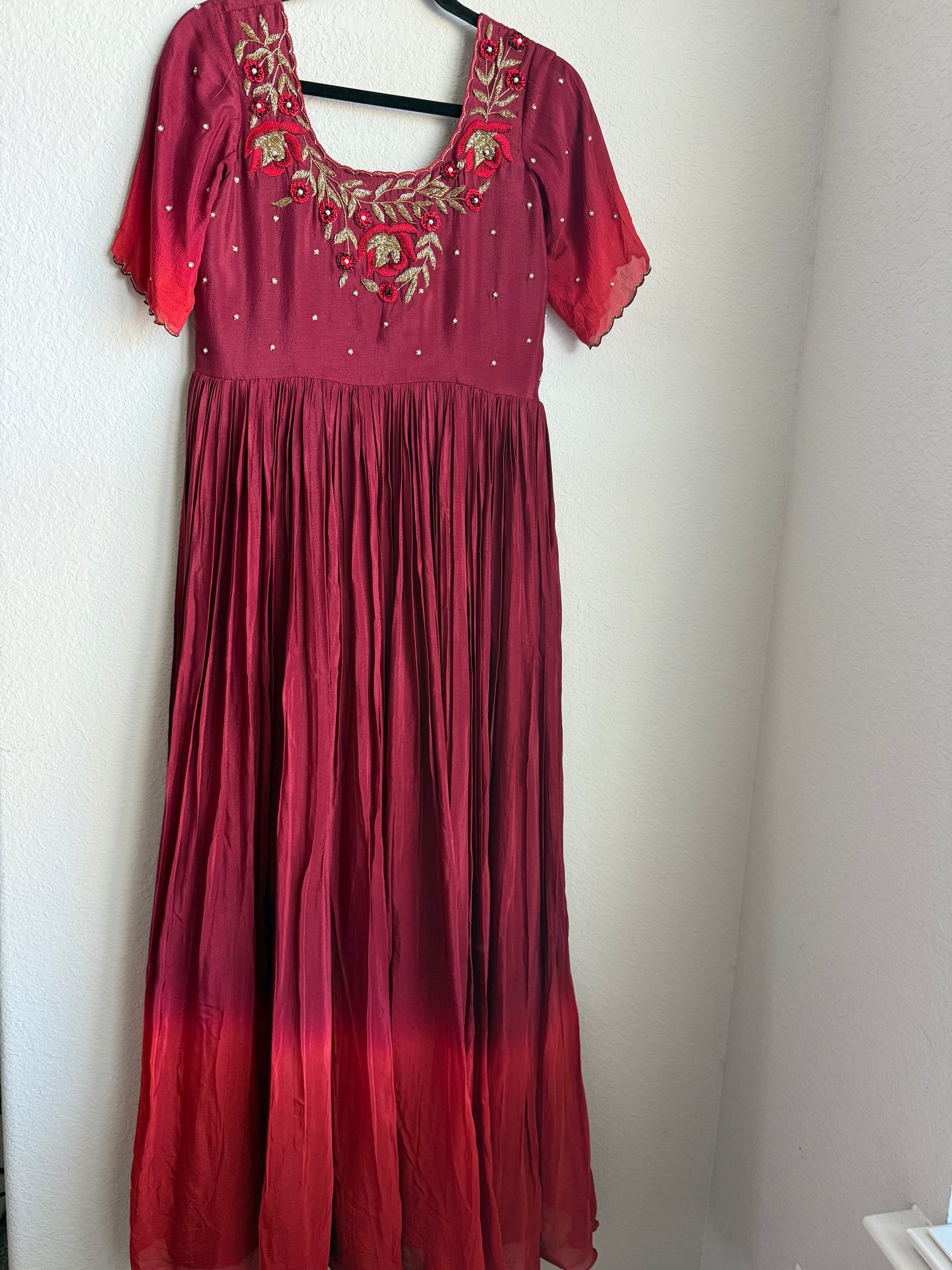 Maroon with red dual shade chinnon long anarkali dress with maggam work detailing on the yolk