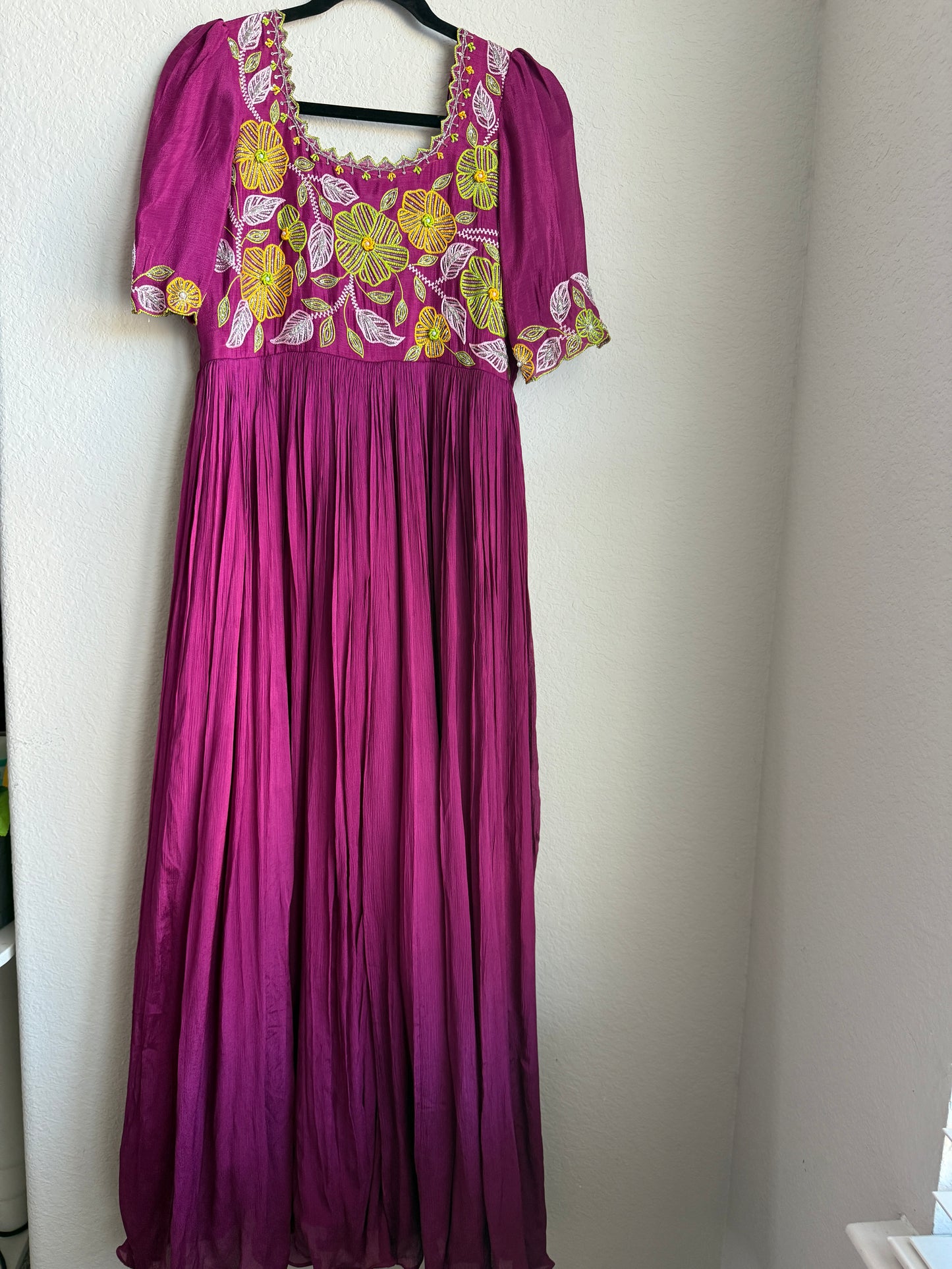 Magenta pink long anarkali designer dress with maggam work on the yolk