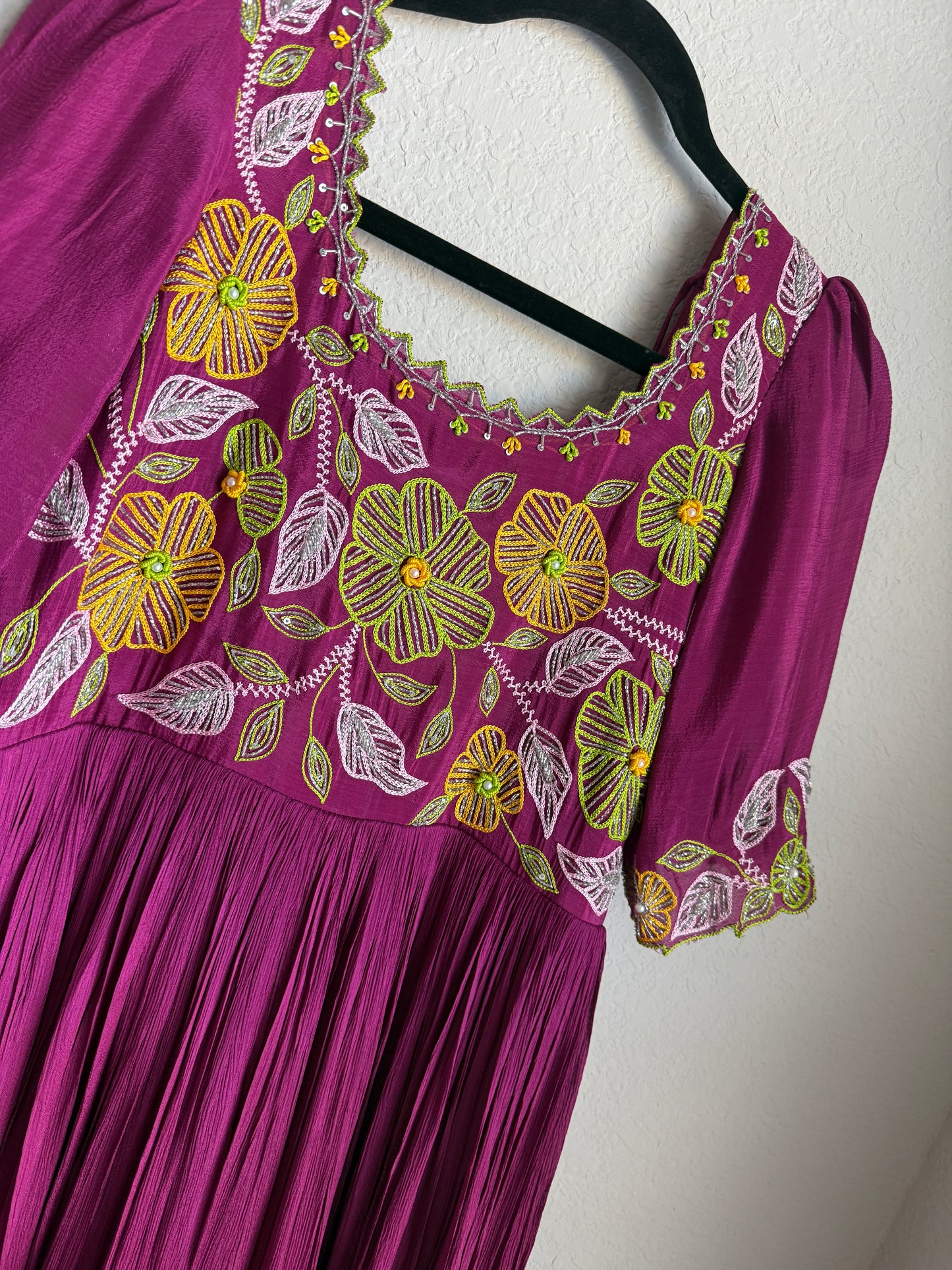 Magenta pink long anarkali designer dress with maggam work on the yolk