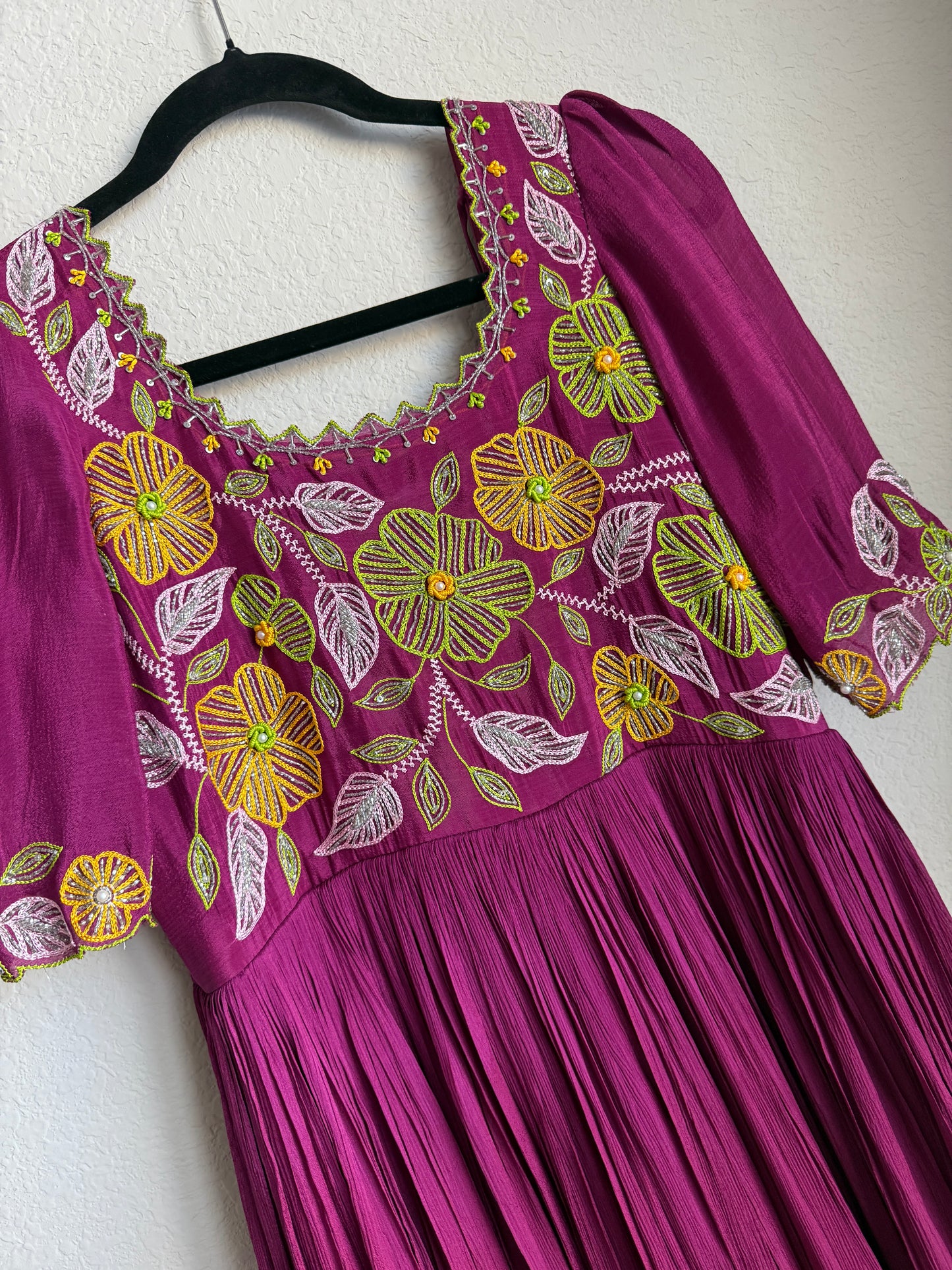 Magenta pink long anarkali designer dress with maggam work on the yolk