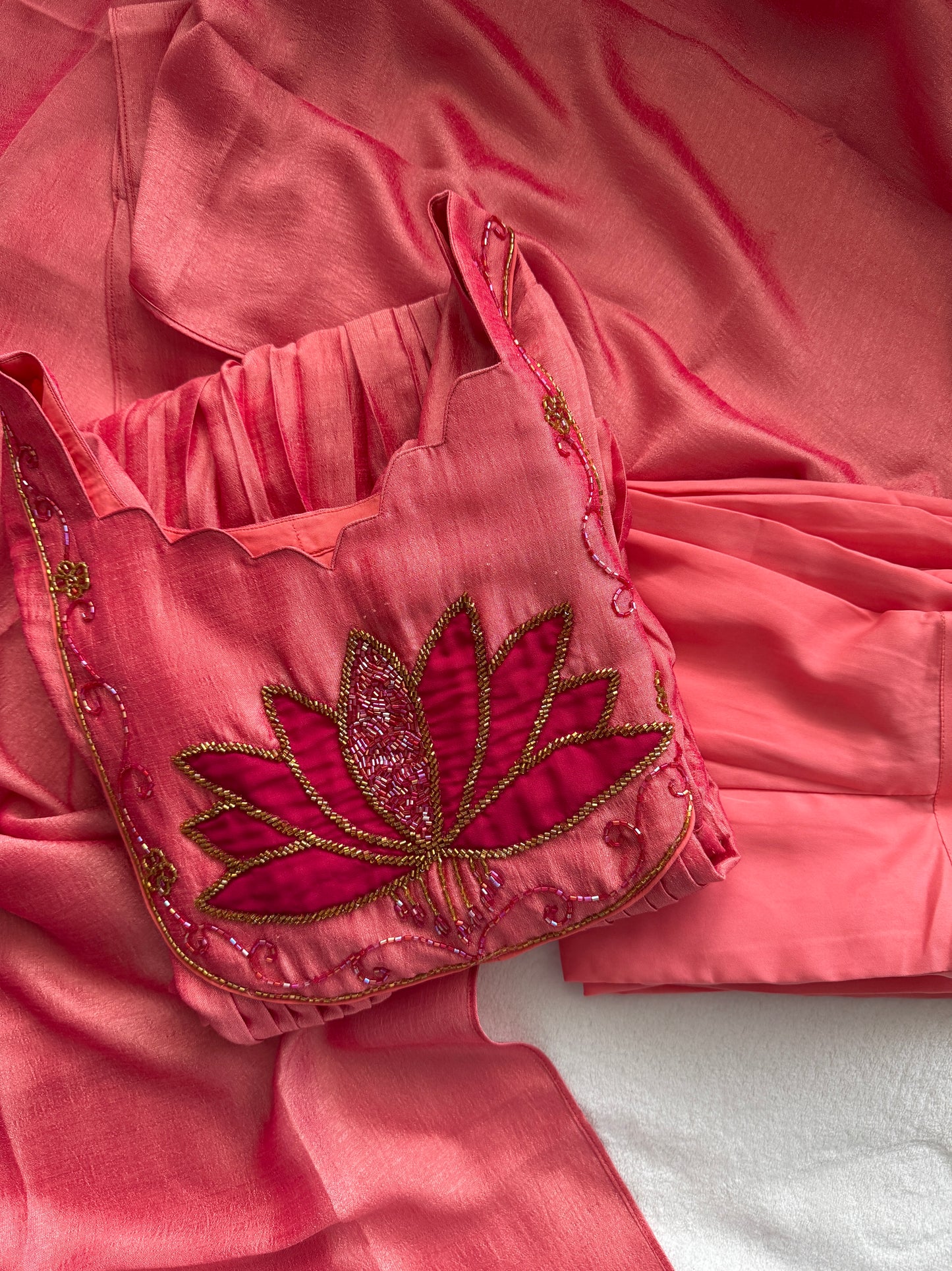 Peach shade lotus handwork customized anarkali set