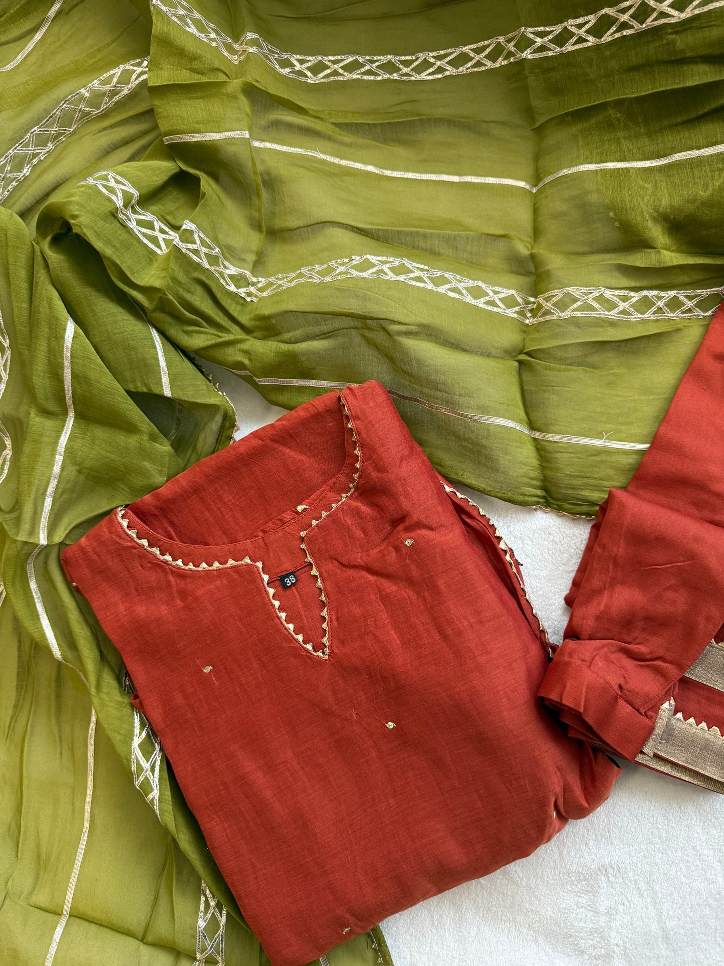 Rust orange mul chanderi kurti set with mehendi green dupatta