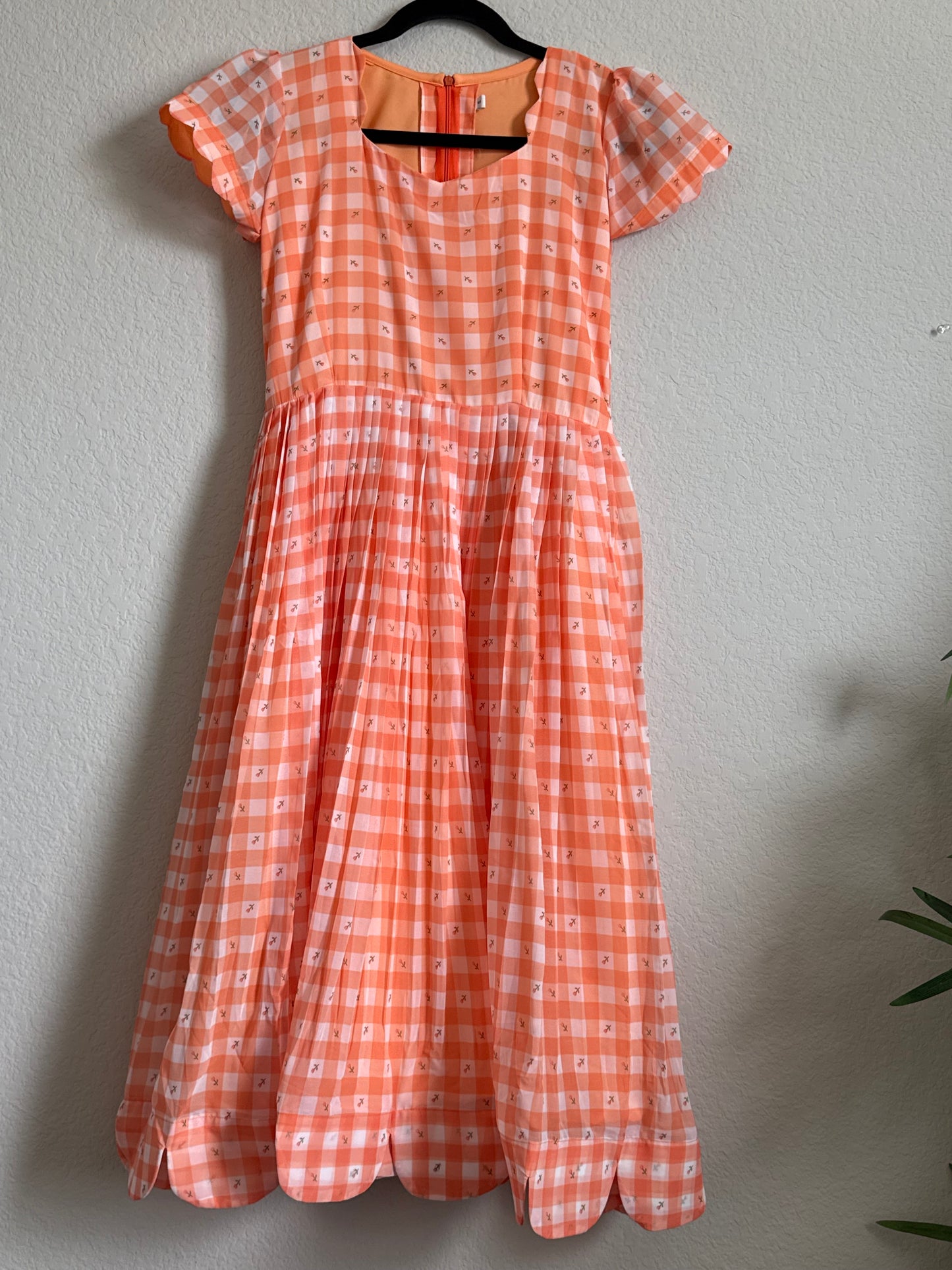 Orange Floral Checks Georgette scallop style frock with short scallop sleeve