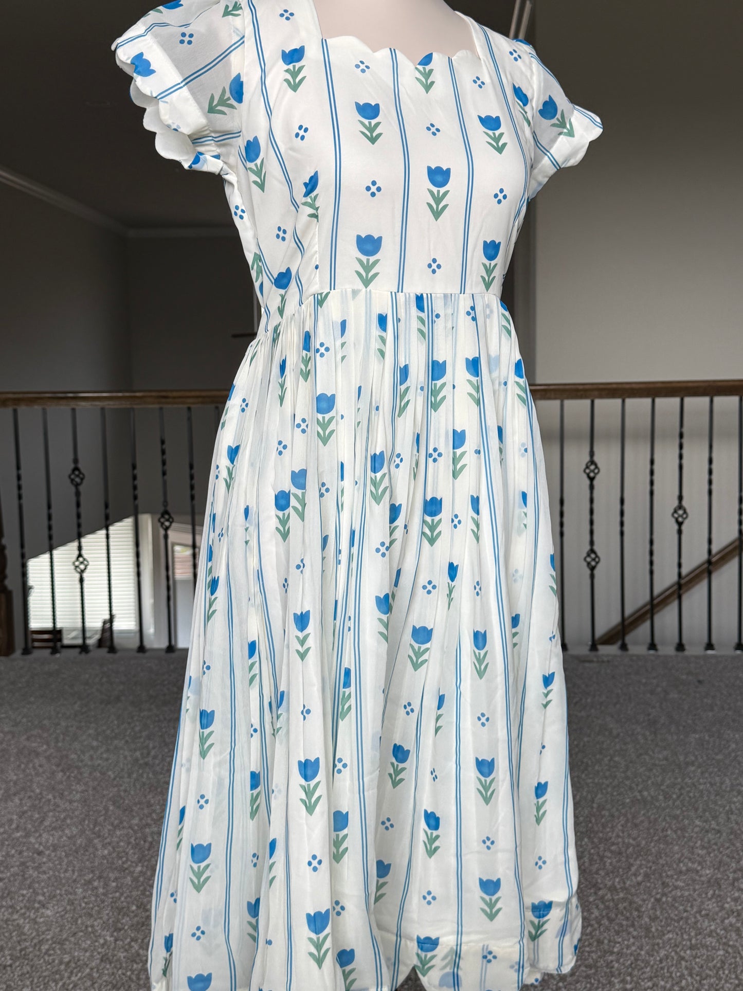 Half White Floral Georgette scallop style frock with short scallop sleeve