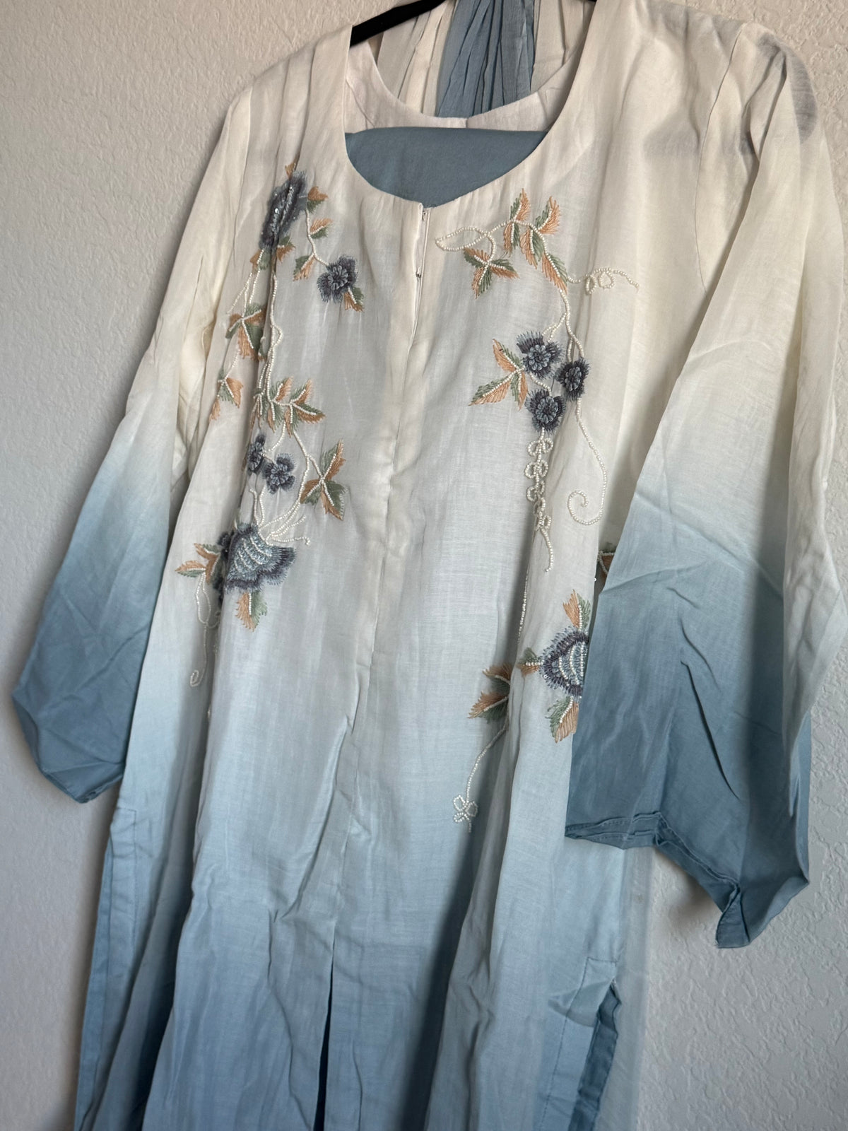 Half white and powder blue mul chanderi handwork aline suit