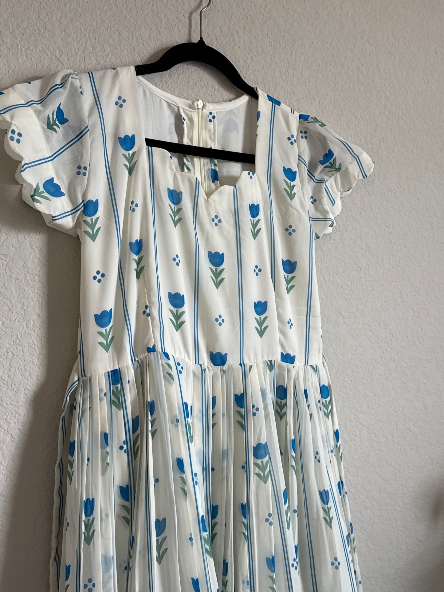 Half White Floral Georgette scallop style frock with short scallop sleeve