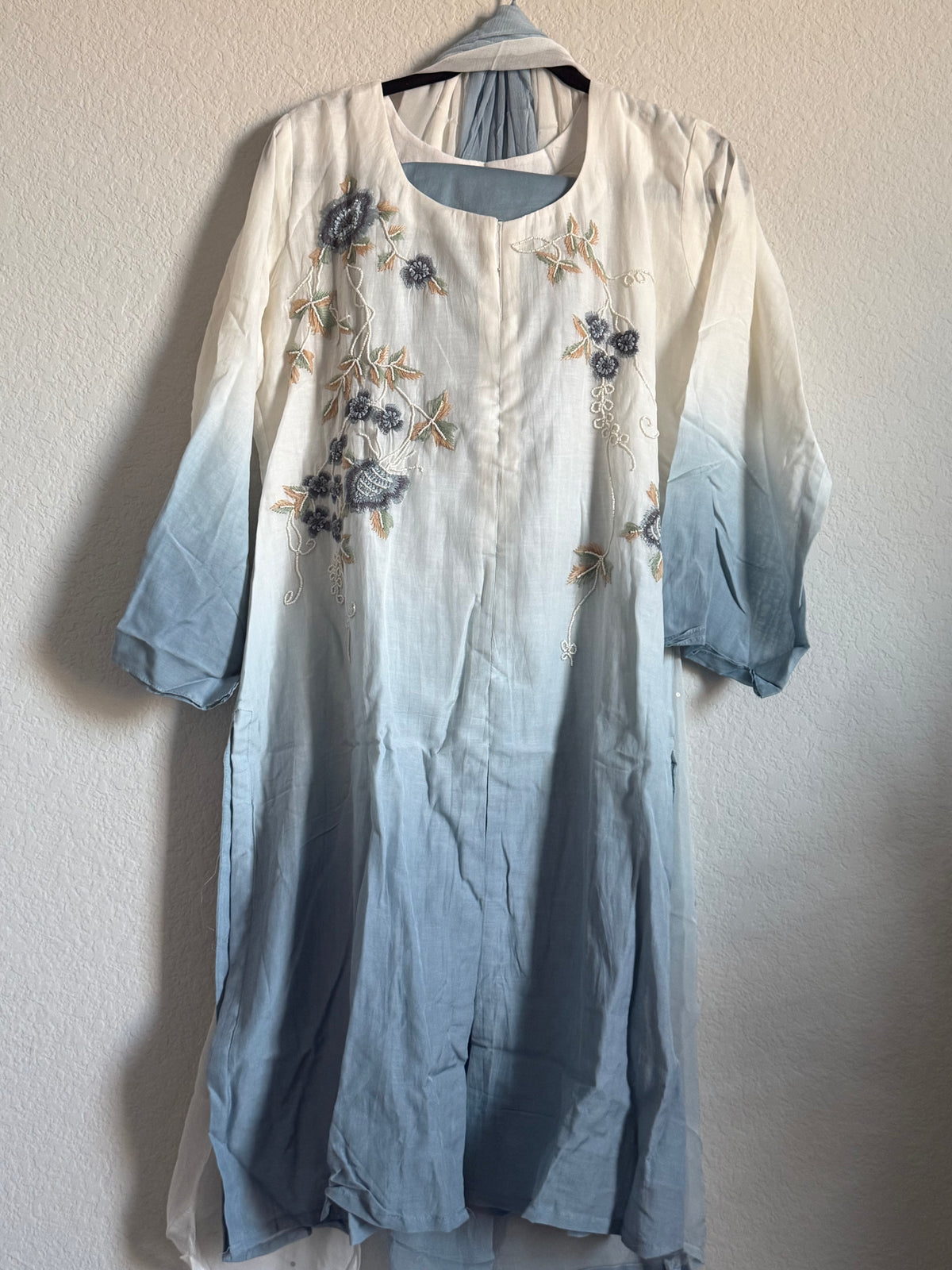 Half white and powder blue mul chanderi handwork aline suit