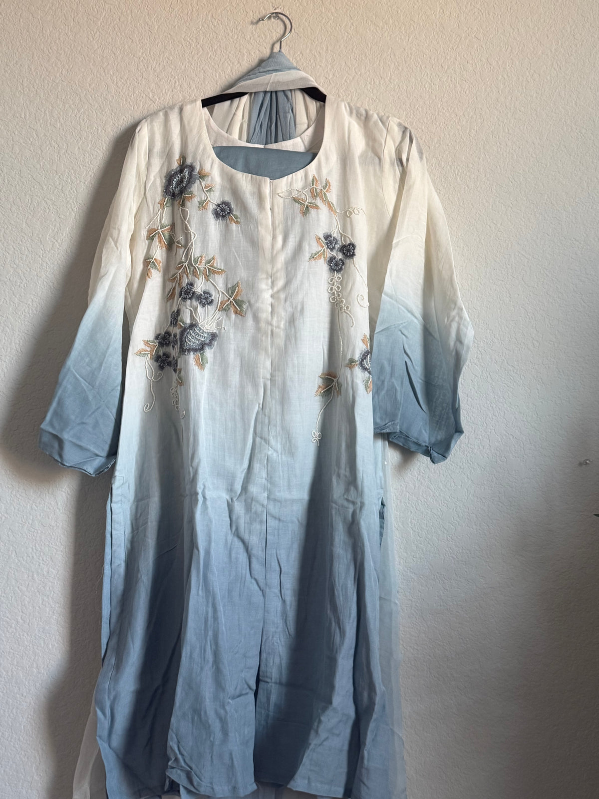 Half white and powder blue mul chanderi handwork aline suit