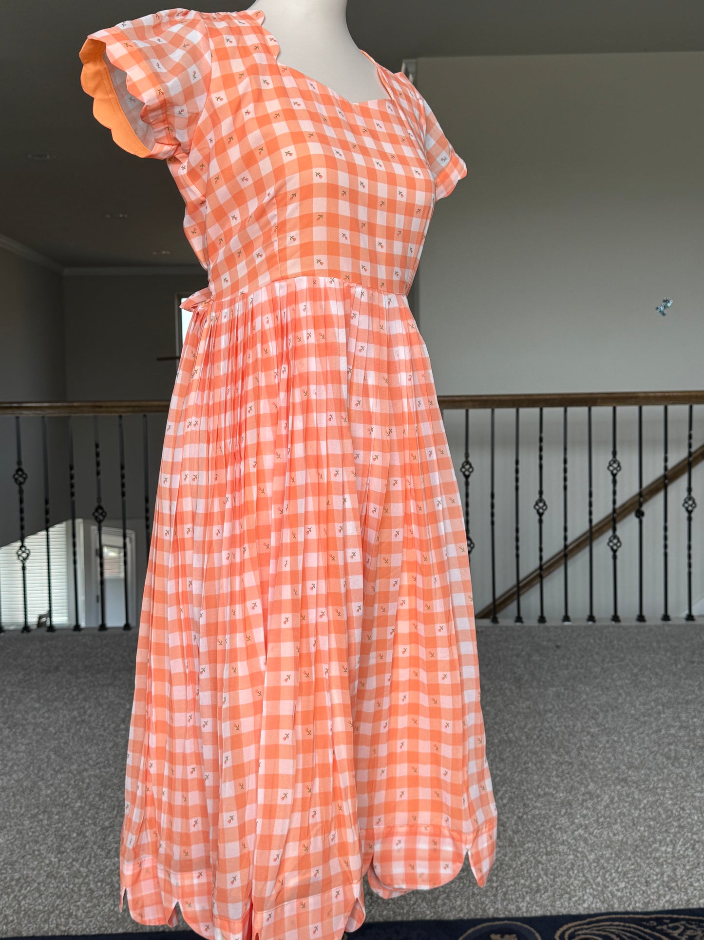 Orange Floral Checks Georgette scallop style frock with short scallop sleeve