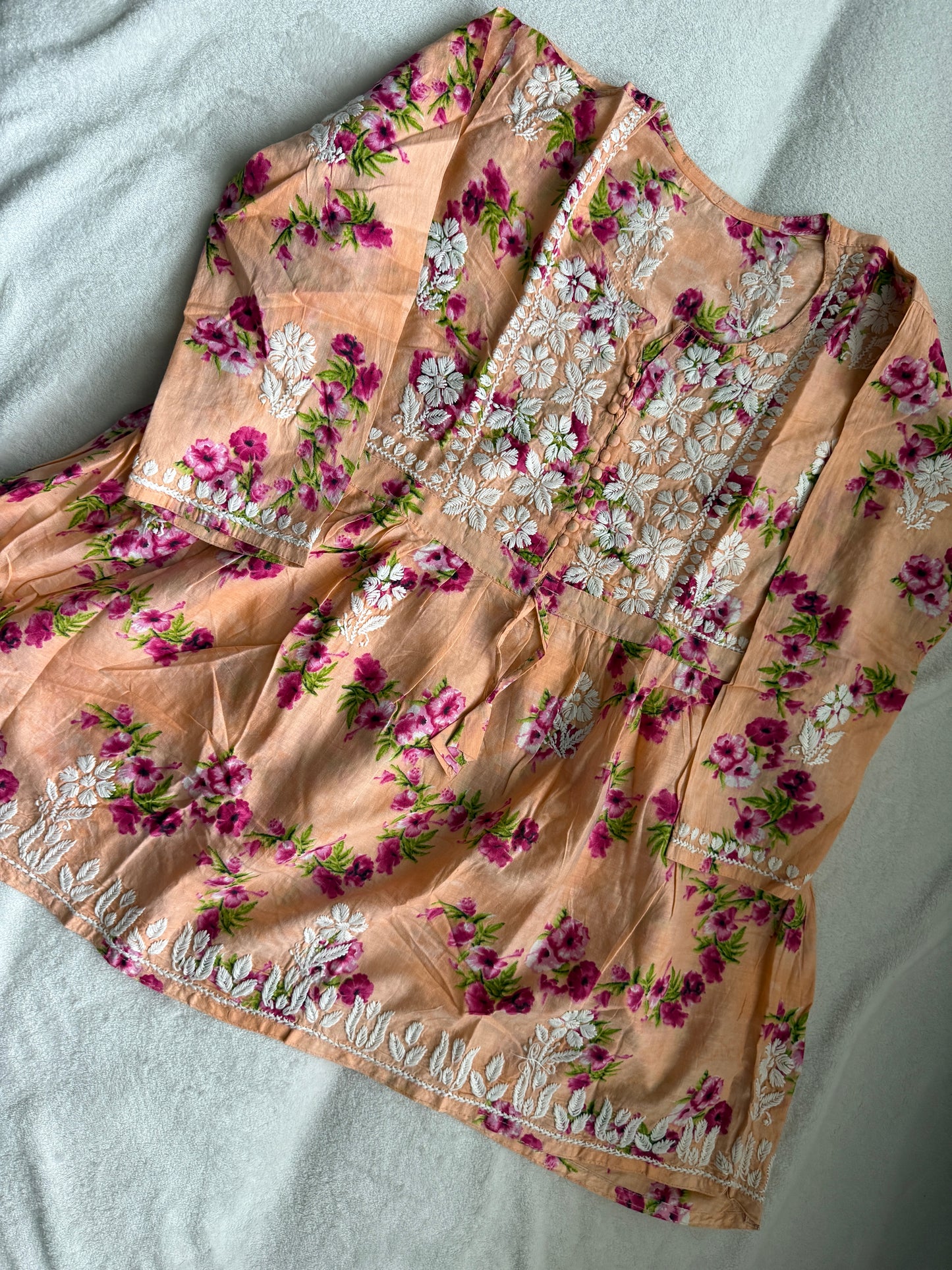 Peach chikankari short kurti - peplum style