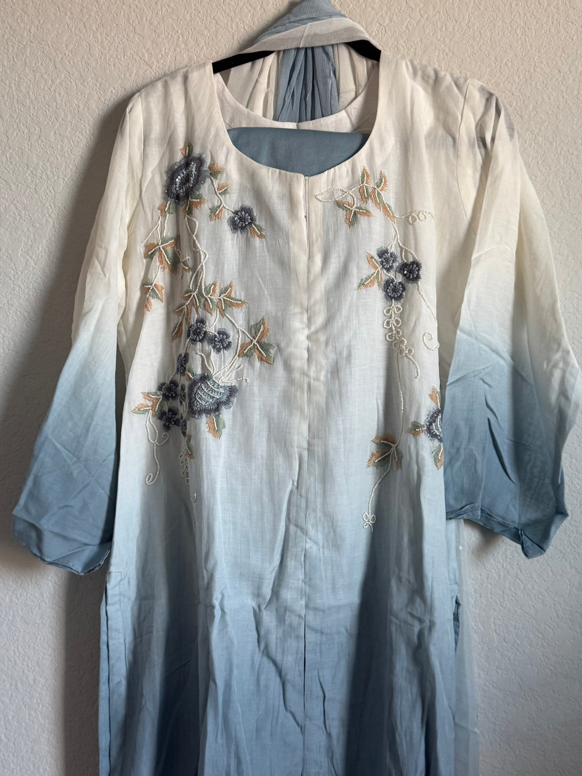 Half white and powder blue mul chanderi handwork aline suit