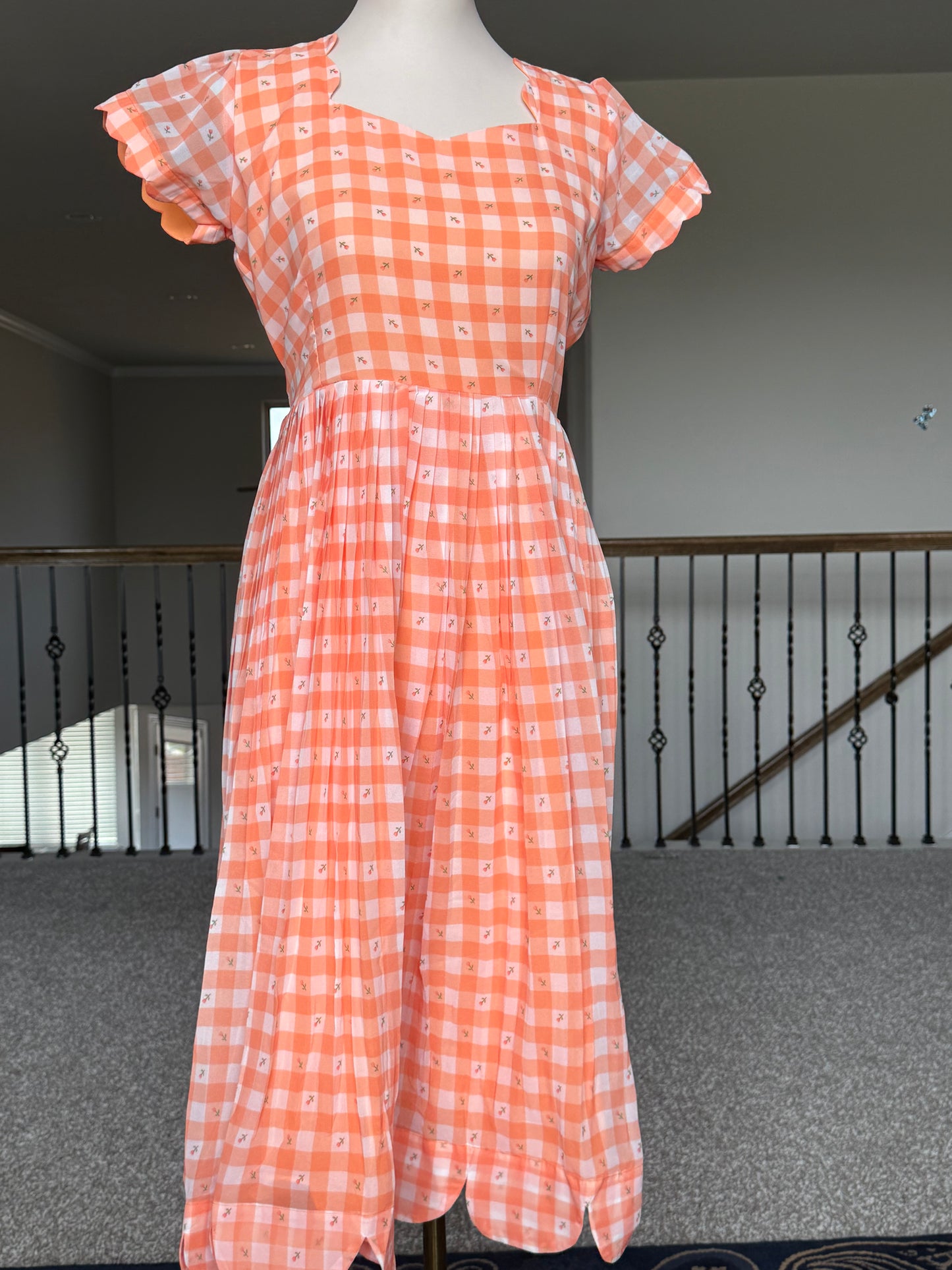 Orange Floral Checks Georgette scallop style frock with short scallop sleeve