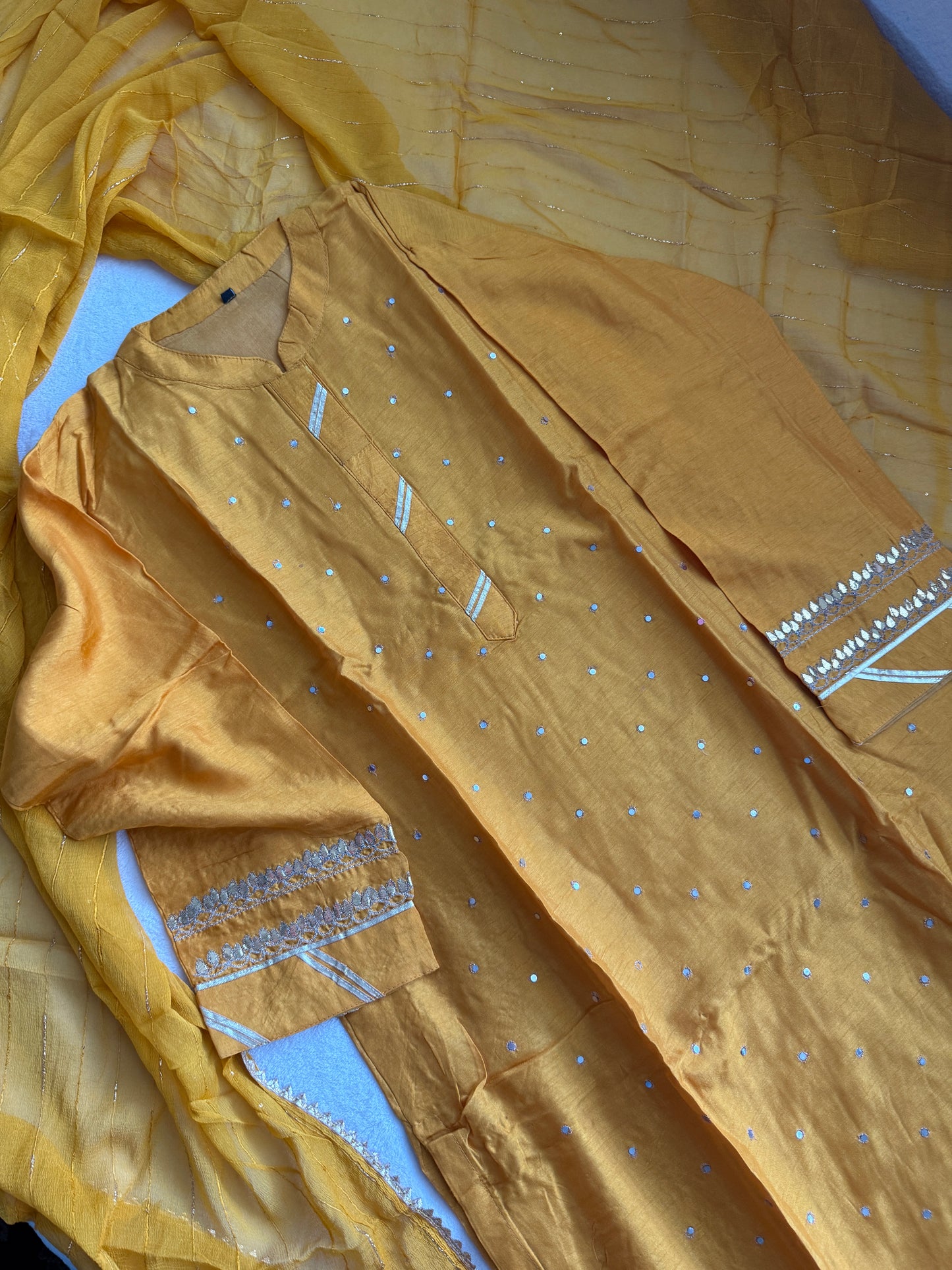 Beautiful dola silk mirror work yellow kurti set
