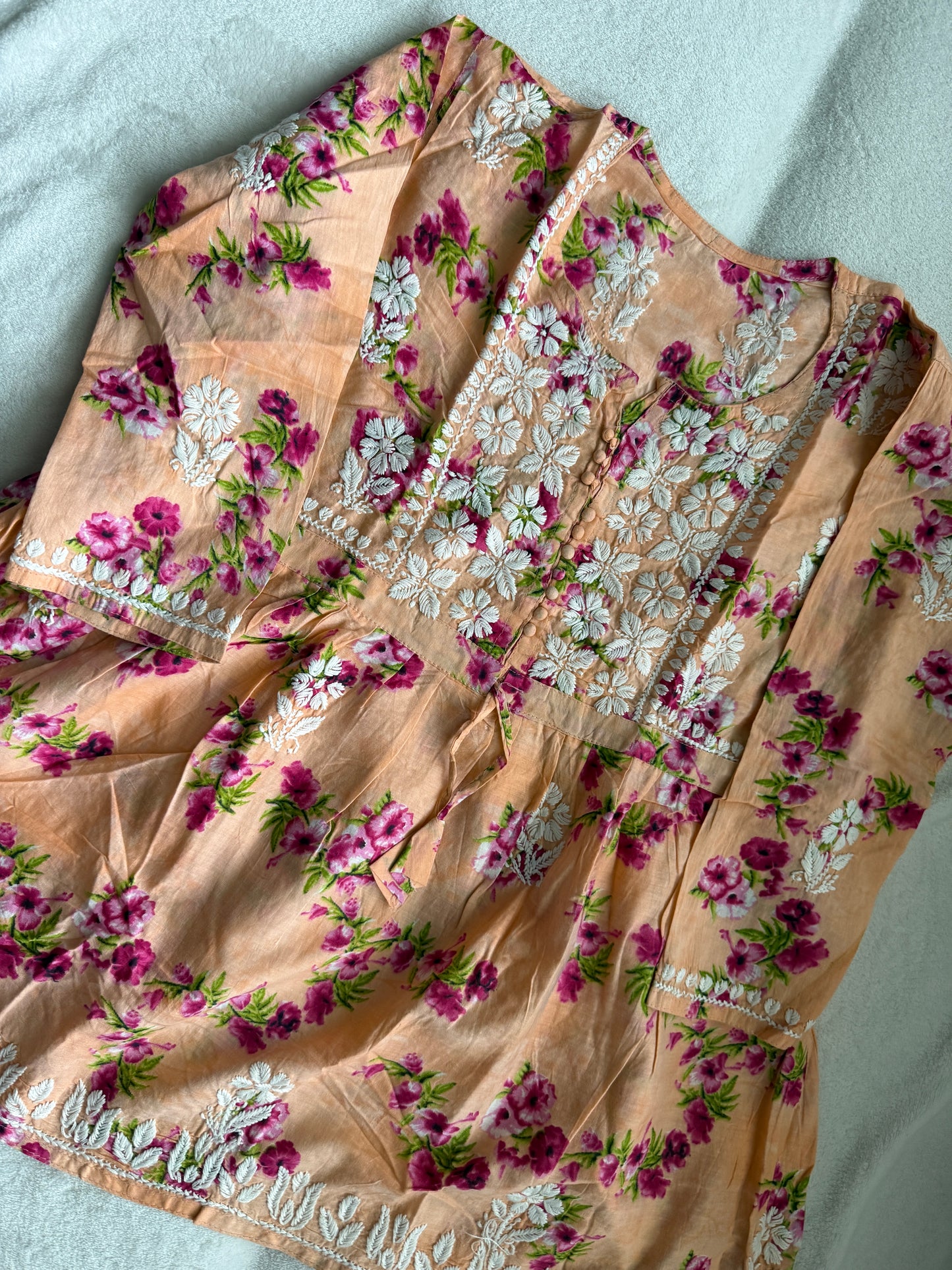 Peach chikankari short kurti - peplum style