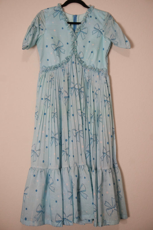 Light blue mul chanderi bow print frock pattern 1