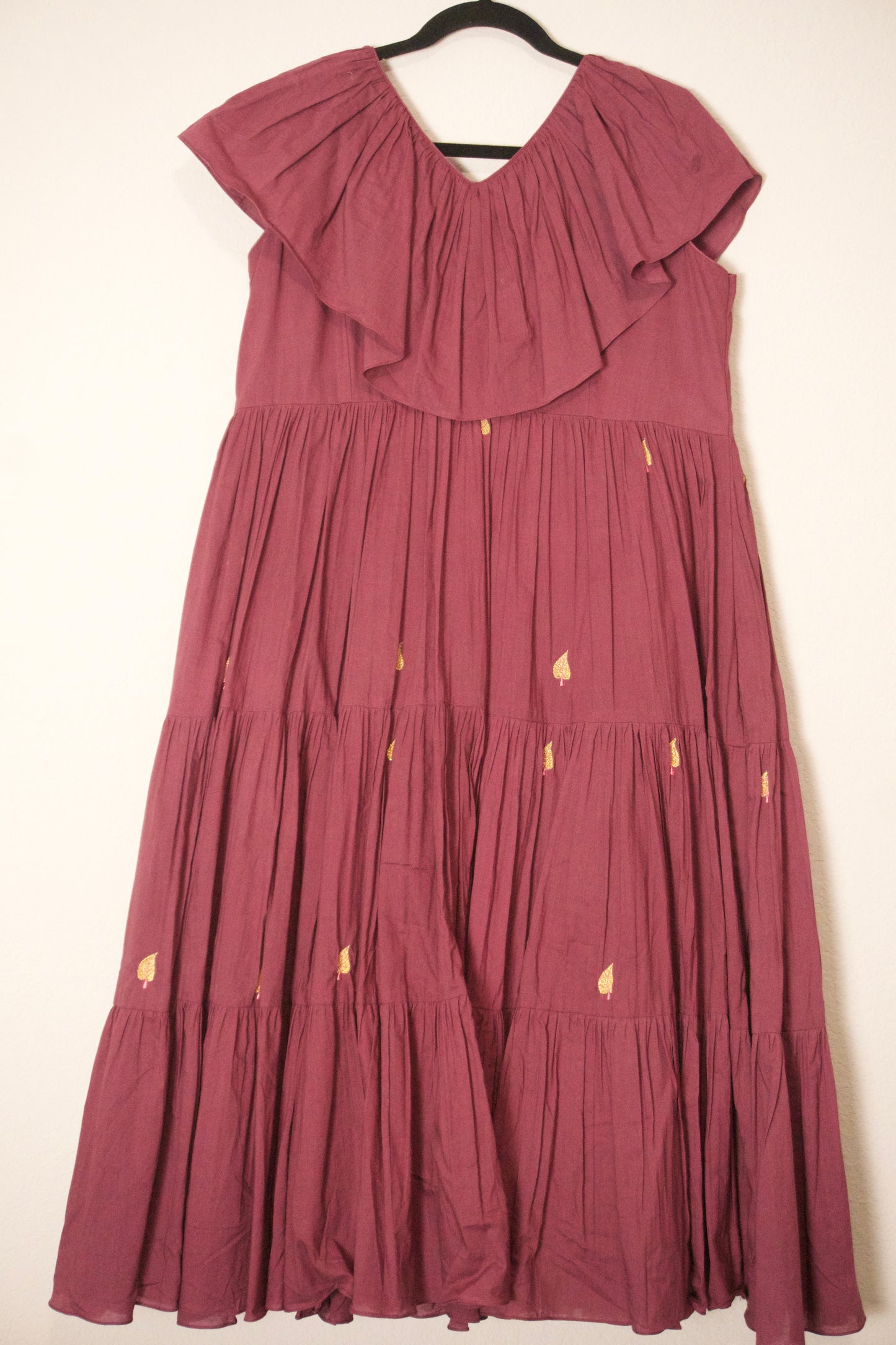 Plum shade mul cotton embroidered frock with unique neck pattern