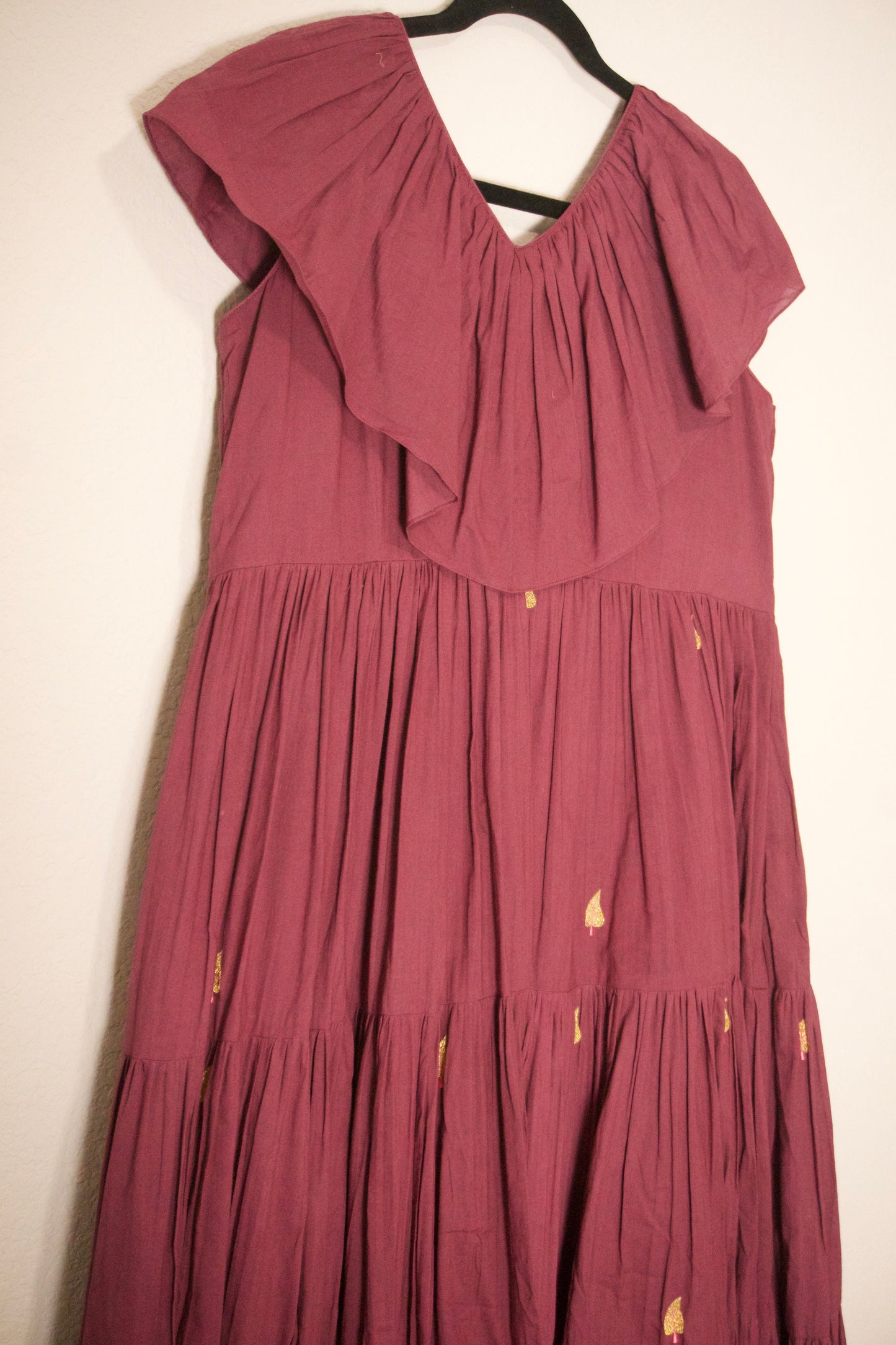 Plum shade mul cotton embroidered frock with unique neck pattern