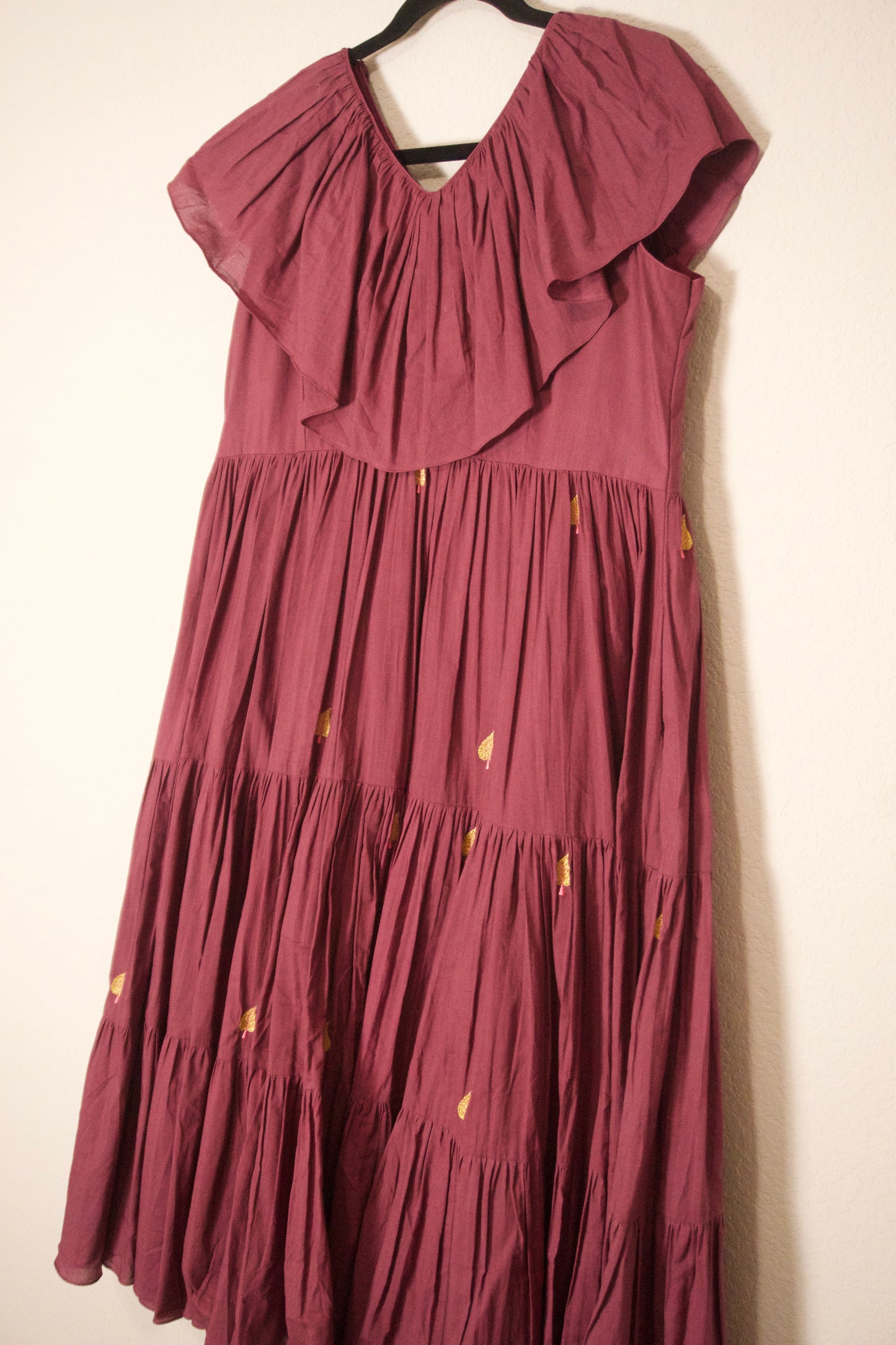 Plum shade mul cotton embroidered frock with unique neck pattern