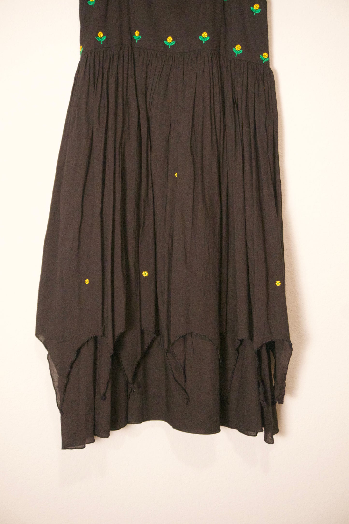 Black swan sleeve embroidered mul cotton frock with flare detailing