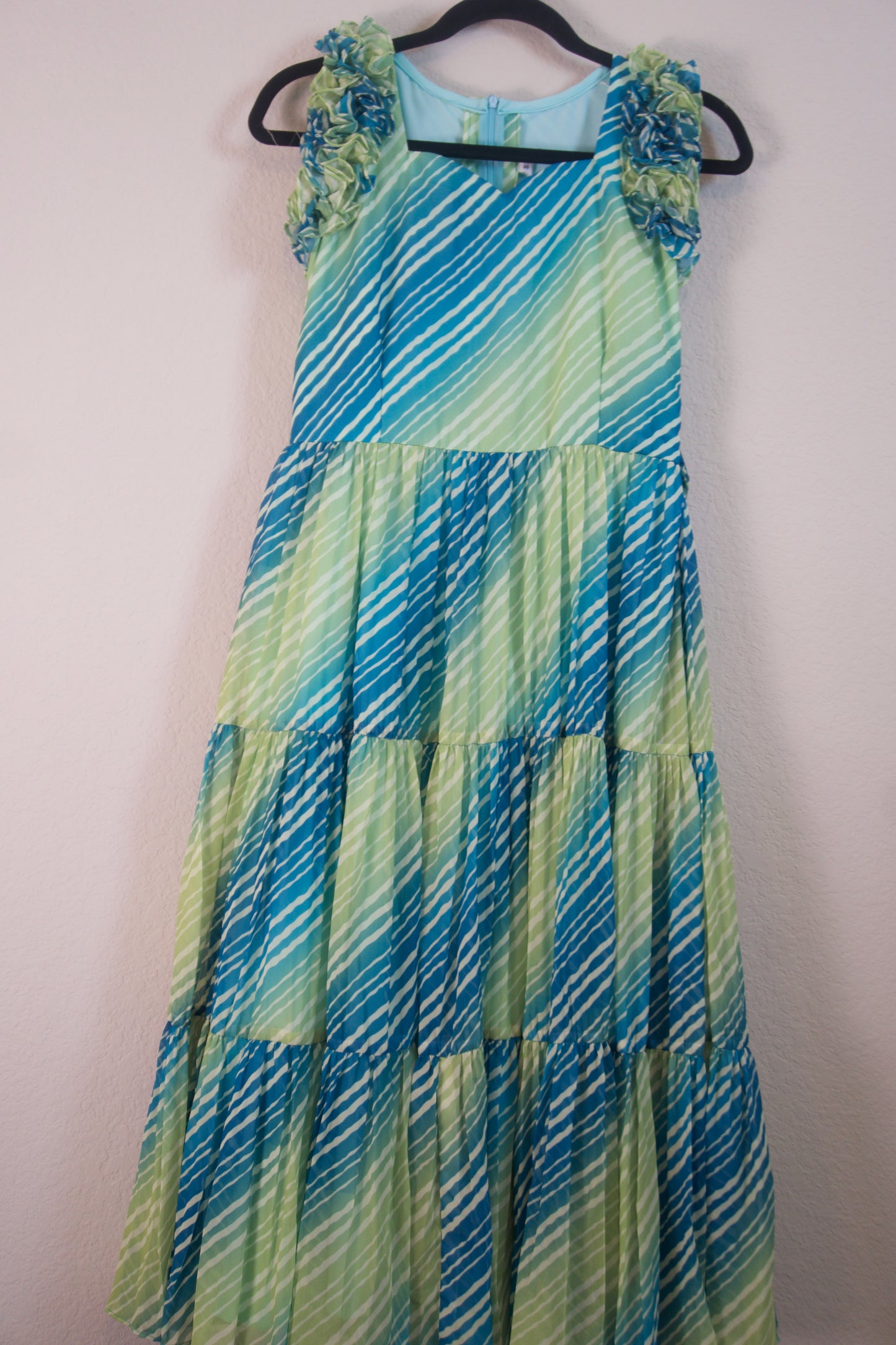 Green Lehariya Georgette 3 tier frock sleeveless style