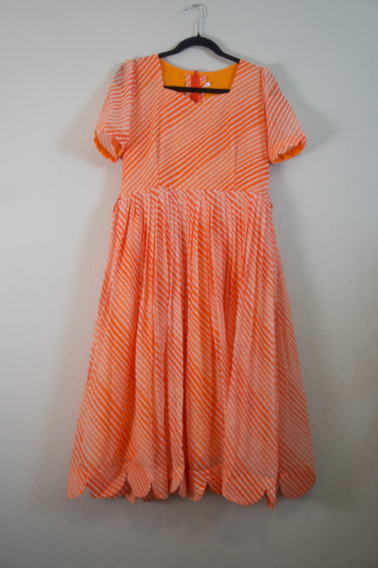 Orange Lehariya Georgette Scallop flare frock with elbow scallop sleeves