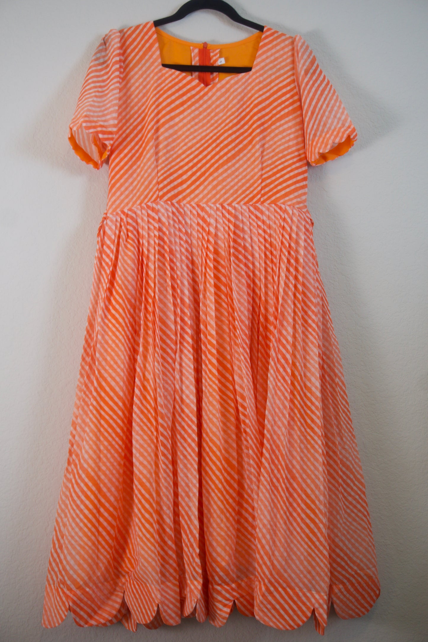Orange Lehariya Georgette Scallop flare frock with elbow scallop sleeves