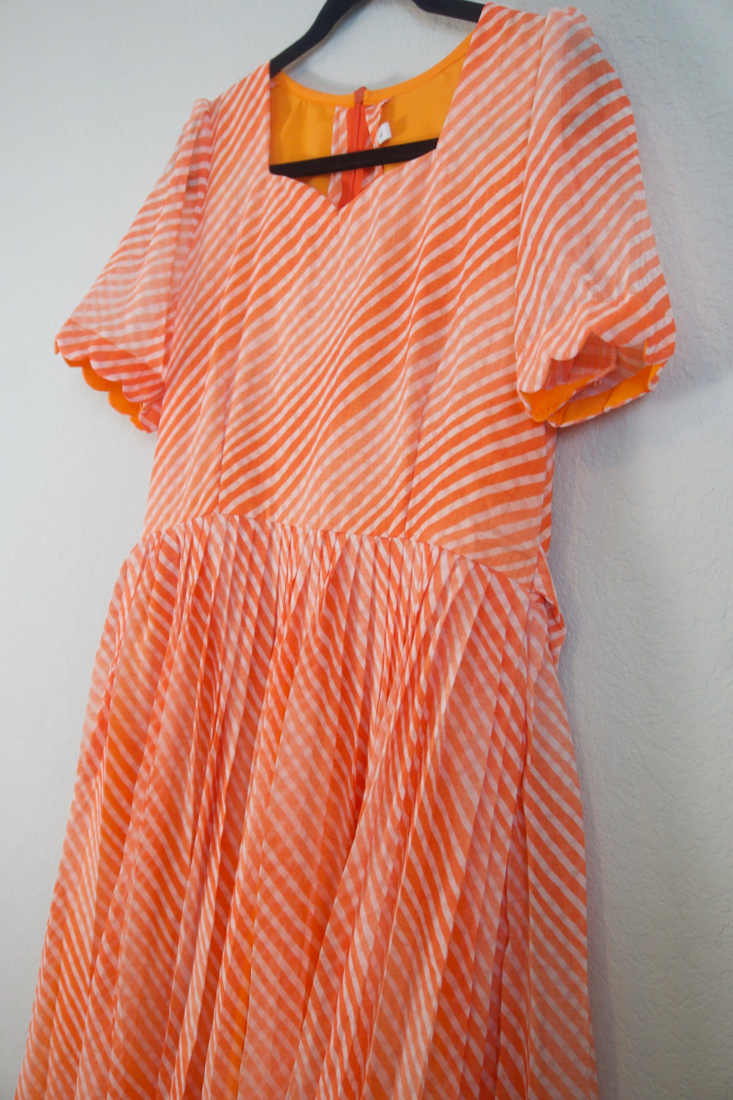 Orange Lehariya Georgette Scallop flare frock with elbow scallop sleeves
