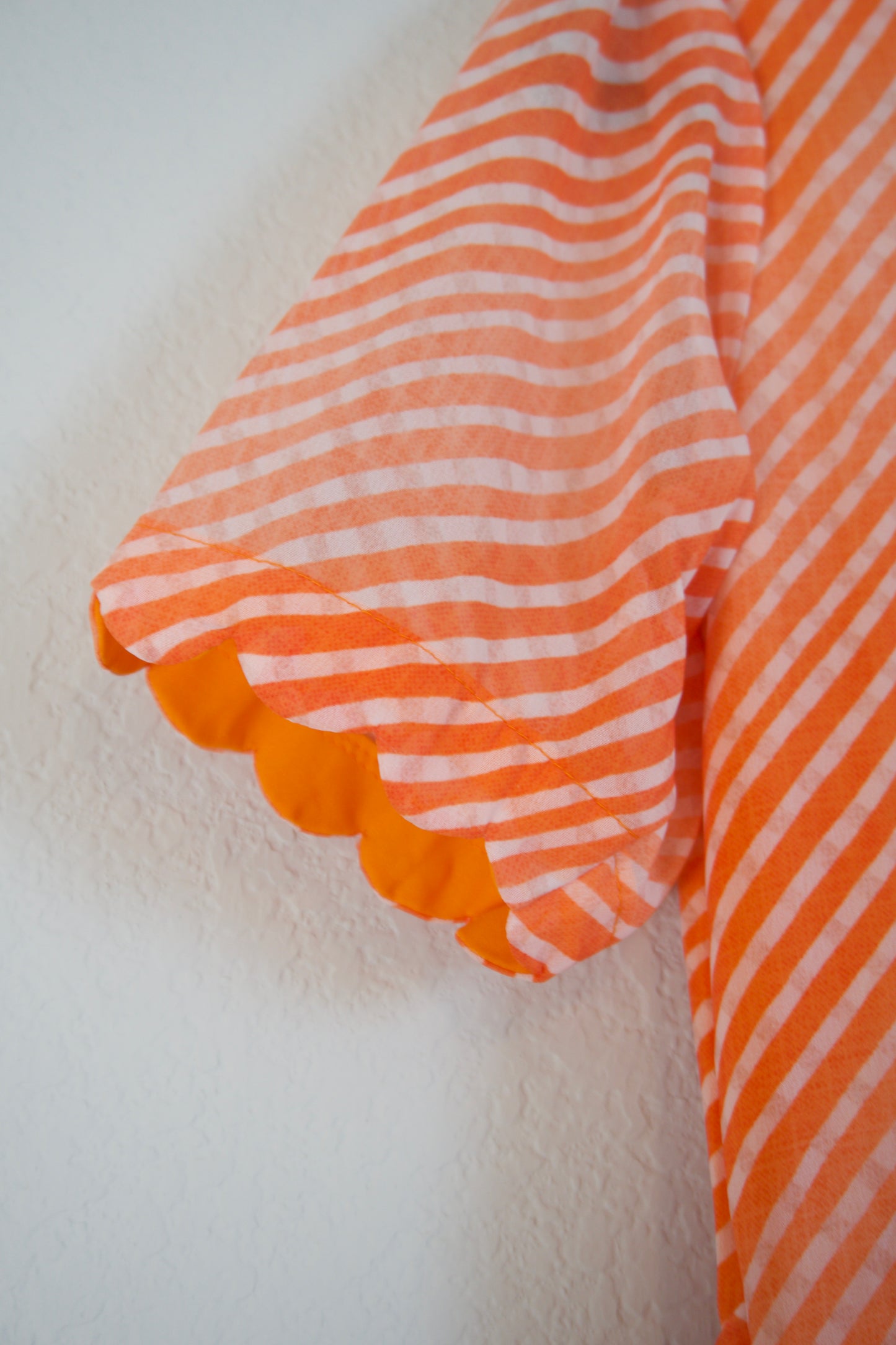 Orange Lehariya Georgette Scallop flare frock with elbow scallop sleeves