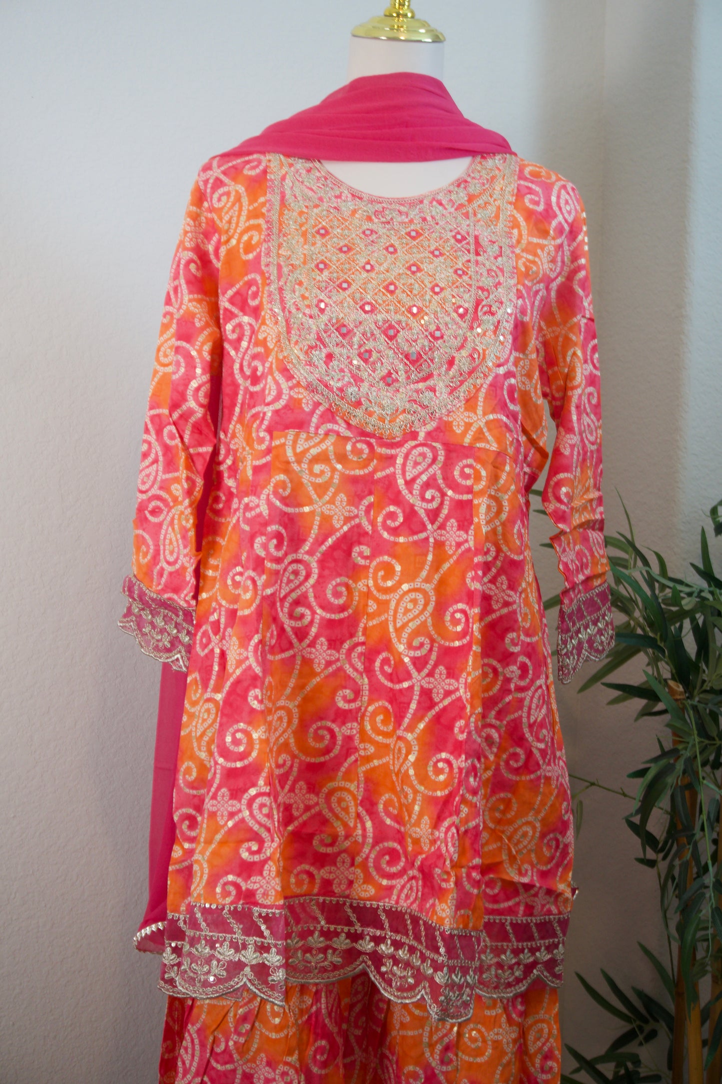 Pink and orange bandhini sharara set