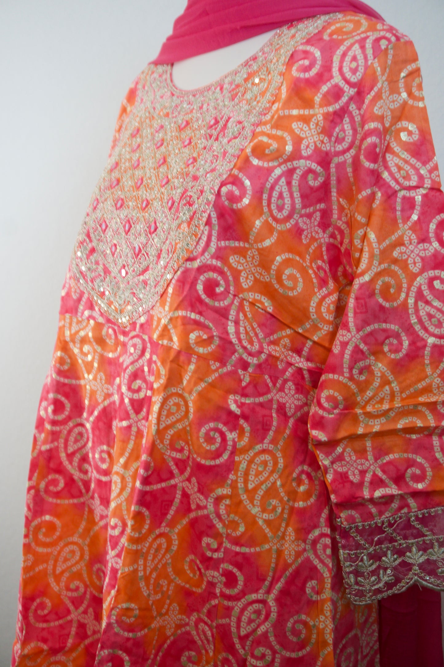 Pink and orange bandhini sharara set