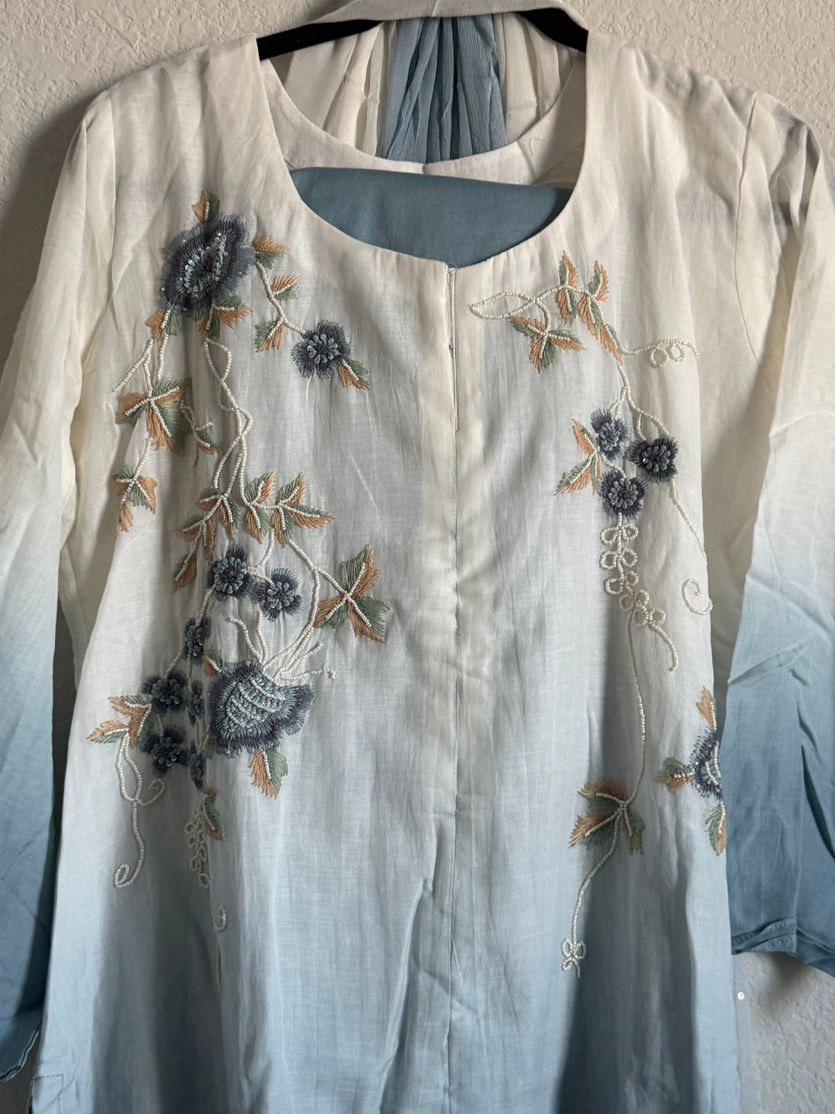 Half white and powder blue mul chanderi handwork aline suit