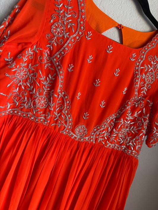 Orange georgette anarkali with silver thread maggam work on yolk